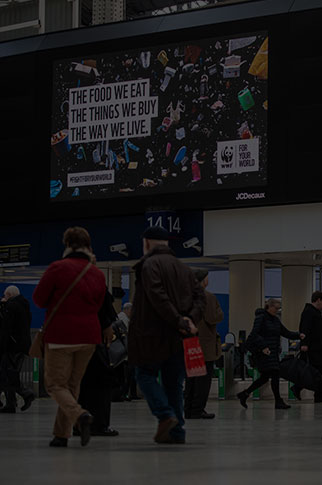  WF-UK brand advert being shown on the screens at London Waterloo train station. 